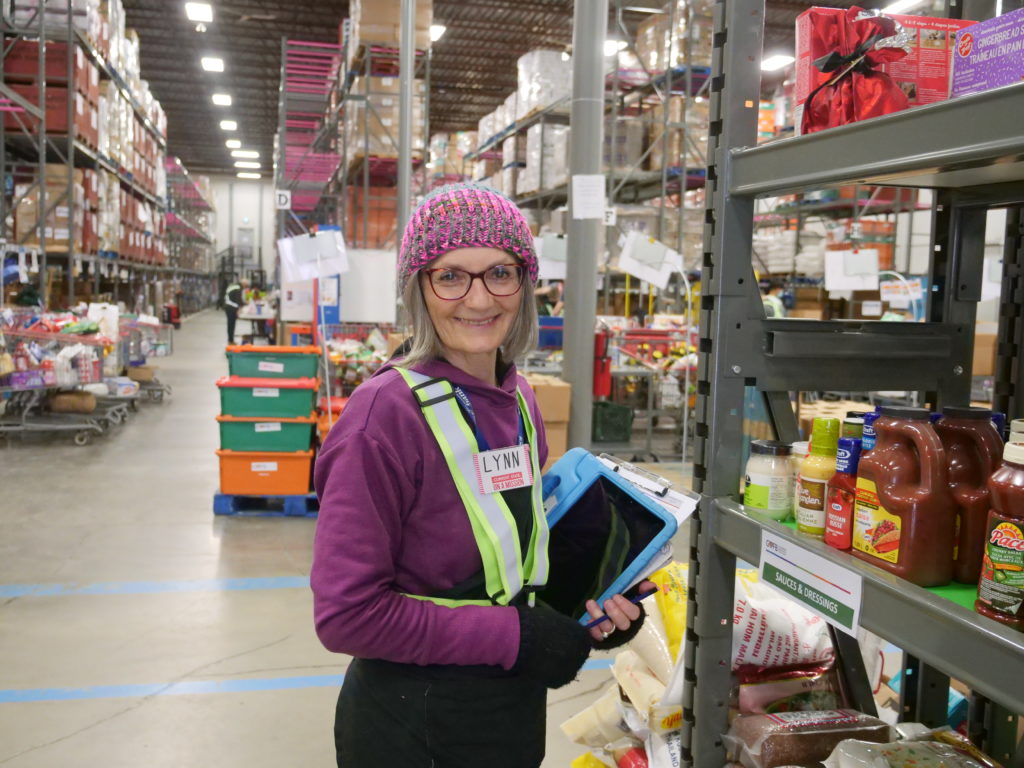 Volunteer in warehouse